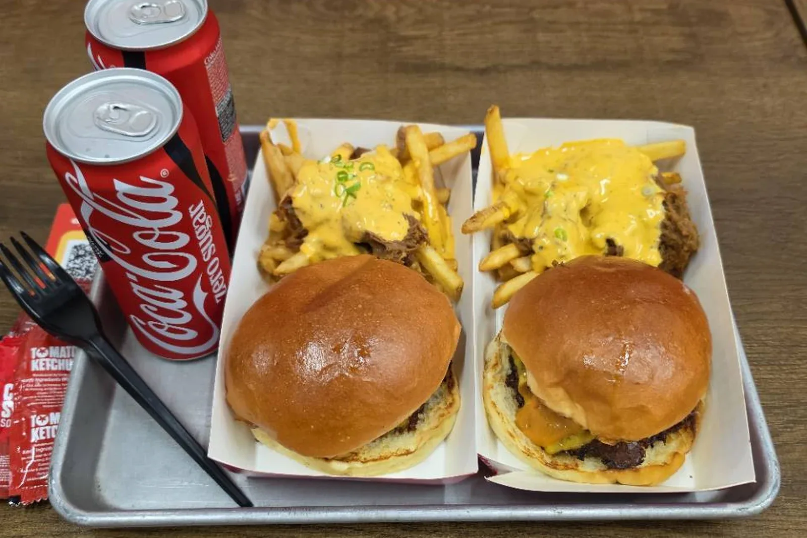 Two Burgs beef burgers served with loaded smoked brisket fries