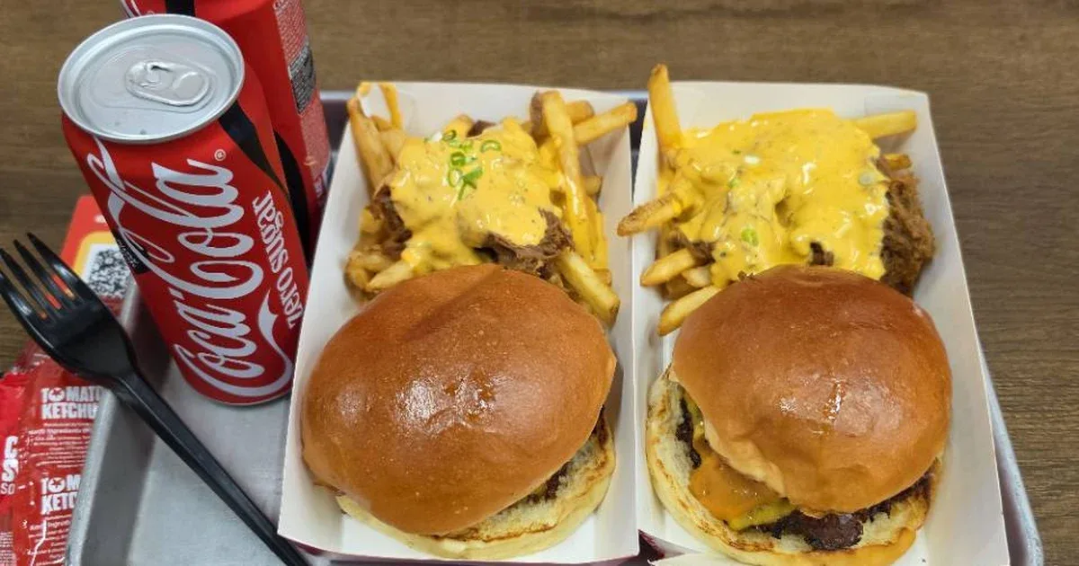 Two Burgs beef burgers served with loaded smoked brisket fries